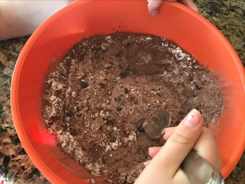stirring brownie mixture